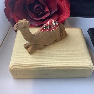 Hand carved wood camel figurine